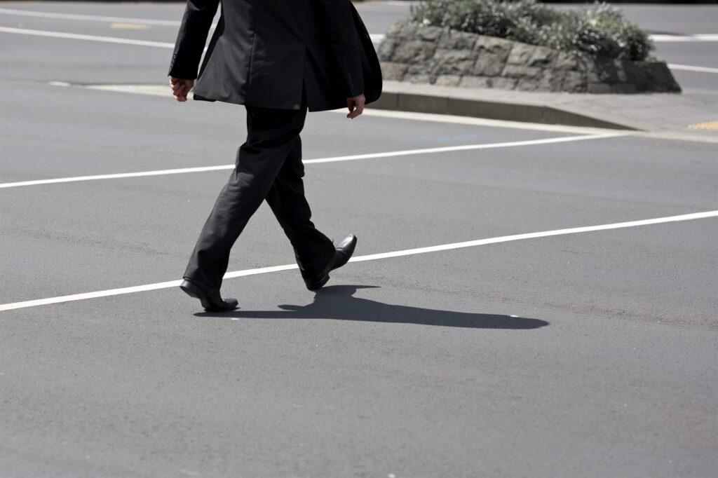Half,Body,Woman,Walking,On, Parking,Area,After,Varicose,Veins,Treatment,Winter,Clothing.